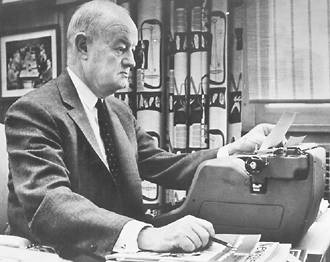 John S. Knight at typewriter